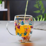 Aesthetic Flowers andFeather InsideDouble Walled Filled Glass Mugs