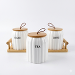 3 piece tea coffee sugar ceramic jar set with wooden tray and loop handle – Home Hatch Pakistantea coffee sugar jar set Pakistanceramic jar set with wooden traykitchen storage jars setHome Hatch kitchen organizerjar set with handle traycoffee sugar tea containerscountertop jar set Pakistanairtight ceramic jars setmodern kitchen storage jarswooden tray jar set