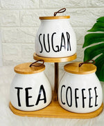3 piece tea coffee sugar storage jar set with wooden stand Home Hatch Pakistantea coffee sugar jar set Pakistankitchen storage jar setwooden stand jar setHome Hatch kitchen organizerceramic storage jars Pakistancoffee sugar tea containerscountertop jar setkitchen organizer jarsairtight storage jars setmodern kitchen storage Pakistan