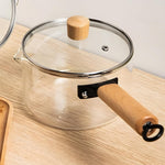 borosilicate glass saucepan with wooden handle and lid heat resistant cooking pot – Home Hatch Pakistanborosilicate glass saucepan Pakistanglass cooking pot with lidtransparent saucepan Pakistanheat resistant glass cookwareHome Hatch cookwareglass milk pot with handleclear cooking saucepanmodern glass cookware Pakistanglass soup potborosilicate kitchen pot