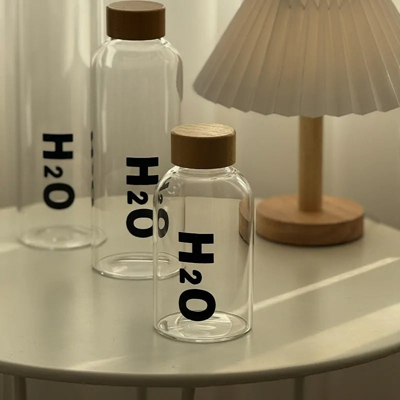 Borosilicate Glass Water Bottle with Wooden Cap – Leakproof H2O Style – Home Hatch Pakistan