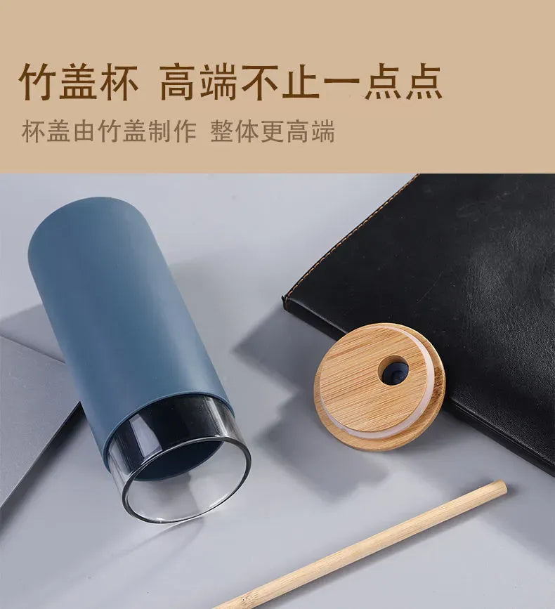 Eco-friendly reusable glass tumbler with bamboo lid & straw for iced coffee