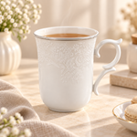 embossed floral ceramic mugceramic mug with lidfloral coffee mugpremium ceramic coffee mugceramic tea cup with liddecorative handle mugelegant coffee mugaesthetic ceramic mugceramic mug Pakistancoffee mug with lid PakistanElegant embossed floral ceramic mug with matching lid and decorative handle for serving tea, coffee and hot beverages at home or office.