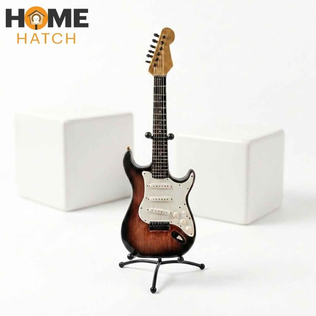 Mini electric guitar decoration showpiece with stand on white background front view