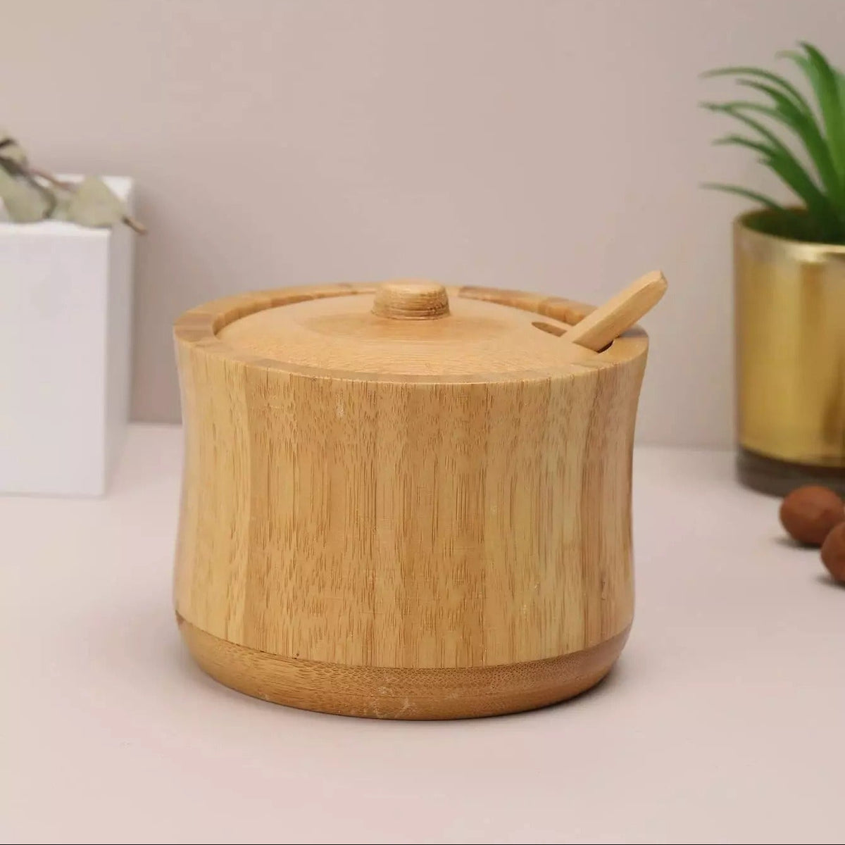 Natural bamboo sugar pot with matching lid and spoon for storing sugar, salt, spices and seasonings on kitchen counters and dining tables.bamboo sugar potbamboo sugar bowlsugar bowl with lid and spoonwooden sugar bowlbamboo sugar containerwooden spice containersugar storage containerbamboo salt containerbamboo kitchen storagebamboo sugar pot Pakistan