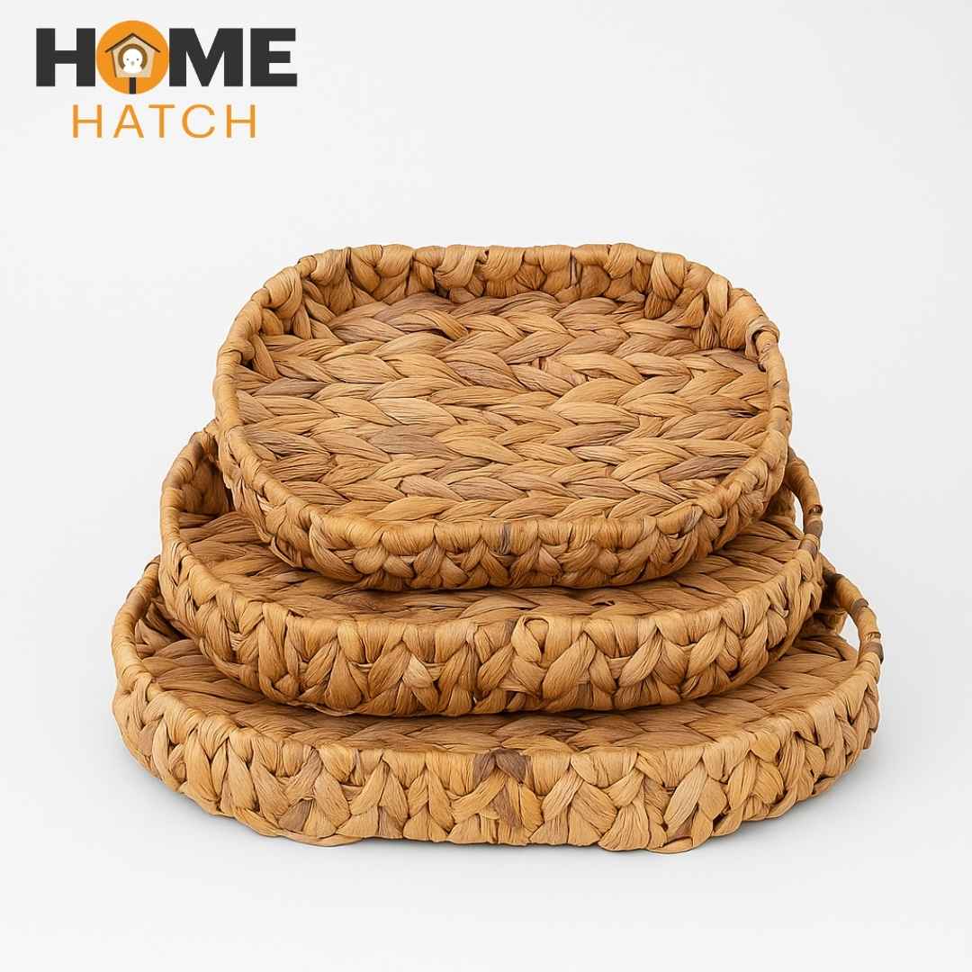 Handwoven oval wicker nested basket set made from natural fibers, ideal for storage, bread, and rustic home décor.