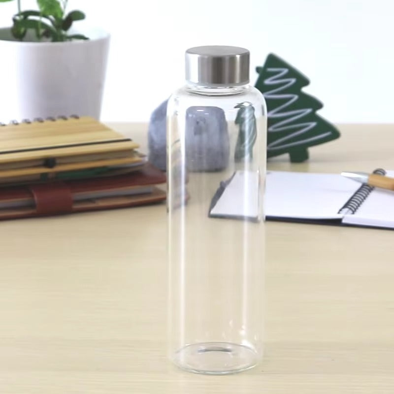 Premium borosilicate glass water bottle 750ml with protective sleeve Home Hatch Pakistan borosilicate glass water bottle Pakistanglass water bottle with sleeve750ml glass bottle Pakistanheat resistant glass bottleHome Hatch water bottleeco friendly water bottle Pakistanreusable glass bottleglass bottle for gym Pakistanpremium glass water bottledurable glass bottle