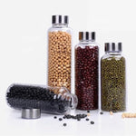 Premium borosilicate glass water bottle 750ml with protective sleeve Home Hatch Pakistan borosilicate glass water bottle Pakistanglass water bottle with sleeve750ml glass bottle Pakistanheat resistant glass bottleHome Hatch water bottleeco friendly water bottle Pakistanreusable glass bottleglass bottle for gym Pakistanpremium glass water bottledurable glass bottle