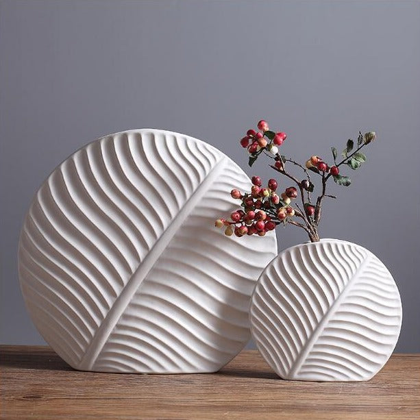 Nordic ceramic vasesleaf shaped ceramic vaseset of 3 ceramic vasesmodern decorative vasesribbed ceramic vaseflower vase setliving room decorative vaseceramic vase for home decormodern home decor vasedecorative vases Pakistan