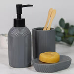 Modern ceramic bathroom accessories set – soap dispenser, tumbler, and soap dish in grey, black, and white by Home Hatch Pakistan