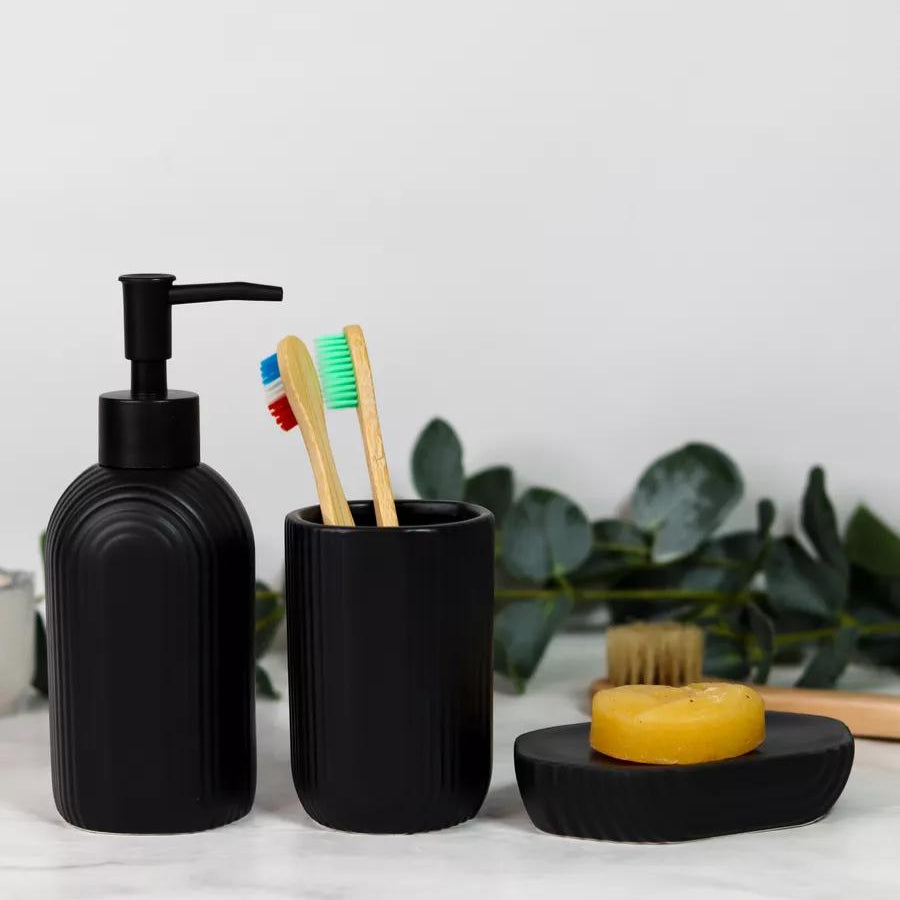 Modern ceramic bathroom accessories set – soap dispenser, tumbler, and soap dish in grey, black, and white by Home Hatch Pakistan
