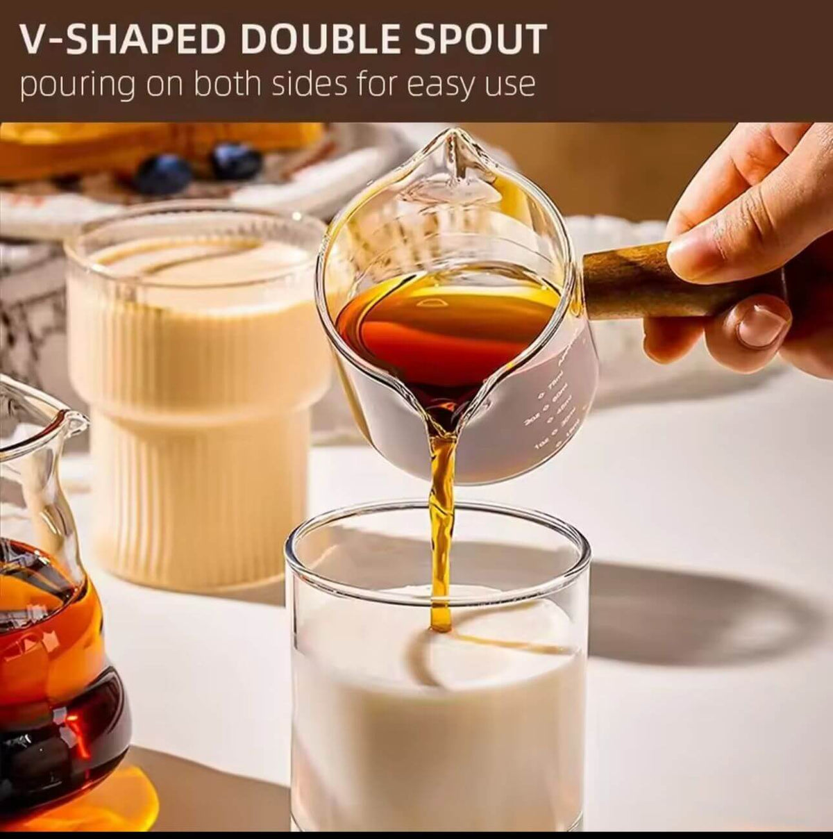 Multi-purpose glass server with wooden handle, used for coffee, milk, sauces, salad dressings, and condiments.