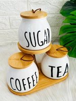 3 piece tea coffee sugar storage jar set with wooden stand Home Hatch Pakistantea coffee sugar jar set Pakistankitchen storage jar setwooden stand jar setHome Hatch kitchen organizerceramic storage jars Pakistancoffee sugar tea containerscountertop jar setkitchen organizer jarsairtight storage jars setmodern kitchen storage Pakistan