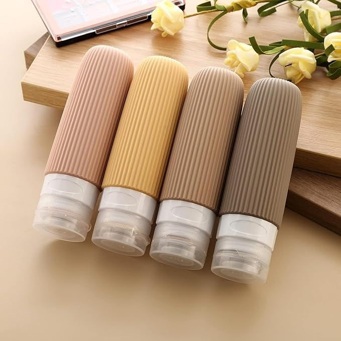 Pack of 4 Refill Travel Bottles for Toiletries – 3oz Leak-Proof With Toiletry Bag