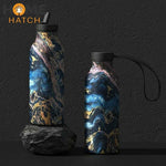 Aurora Marble Dual-Lid Stainless Steel Insulated Bottle – Hot & Cold Leakproof Tumbler – Home Hatch Pakistan”