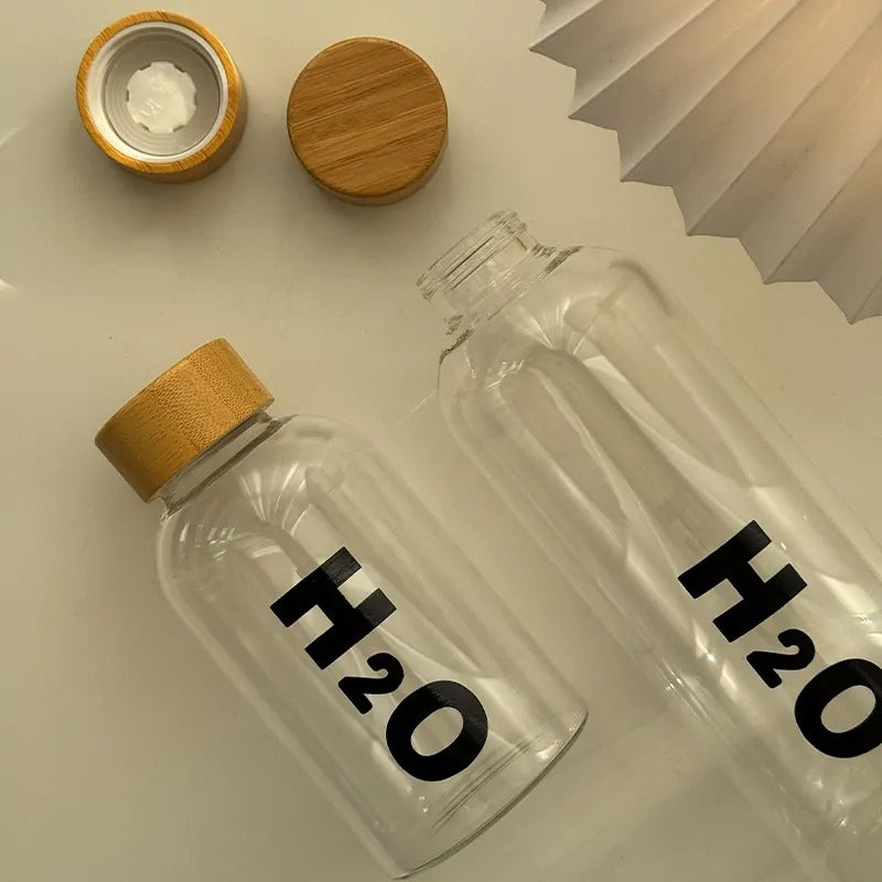 Borosilicate Glass Water Bottle with Wooden Cap – Leakproof H2O Style – Home Hatch Pakistan
