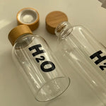 Borosilicate Glass Water Bottle with Wooden Cap – Leakproof H2O Style – Home Hatch Pakistan