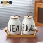 Ceramic tea and sugar storage jars with bamboo lids and wooden tray – Home Hatch Pakistan