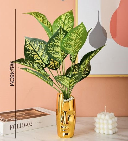 Golden Minimalistic Ceramic Half Face Vase With Flower