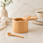 Natural bamboo sugar bowl with small spoon and magnetic swivel lid for storing sugar, salt, spices and kitchen seasonings.bamboo sugar bowlsugar bowl with spoonbamboo sugar bowl with lidmagnetic lid sugar bowlwooden sugar containerbamboo spice containersugar storage containersalt and spice containerbamboo kitchen organizerbamboo sugar bowl Pakistan