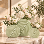 Set of 2 & 3 Nordic leaf-shaped ribbed ceramic decorative flower vases for modern living room, console table and home décor. Nordic ceramic vasesleaf shaped ceramic vaseset of 3 ceramic vasesmodern decorative vasesribbed ceramic vaseflower vase setliving room decorative vaseceramic vase for home decormodern home decor vasedecorative vases Pakistan