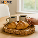 Handwoven oval wicker nested basket set made from natural fibers, ideal for storage, bread, and rustic home décor.