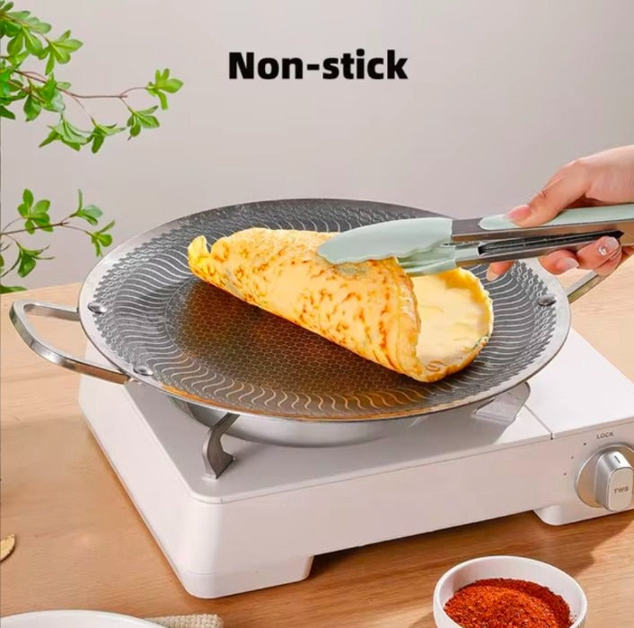 Premium honeycomb non-stick stainless steel tawa – Home Hatch Pakistan honeycomb non stick steel tawastainless steel tawa Pakistannon stick frying pan Pakistanroti tawa stainless steelHome Hatch cookwareparatha tawa non stickhoneycomb frying pankitchen cookware Pakistansteel cooking pandurable non stick tawa