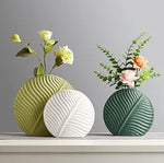 Nordic ceramic vasesleaf shaped ceramic vaseset of 3 ceramic vasesmodern decorative vasesribbed ceramic vaseflower vase setliving room decorative vaseceramic vase for home decormodern home decor vasedecorative vases Pakistan