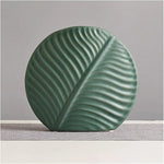 Nordic ceramic vasesleaf shaped ceramic vaseset of 3 ceramic vasesmodern decorative vasesribbed ceramic vaseflower vase setliving room decorative vaseceramic vase for home decormodern home decor vasedecorative vases Pakistan