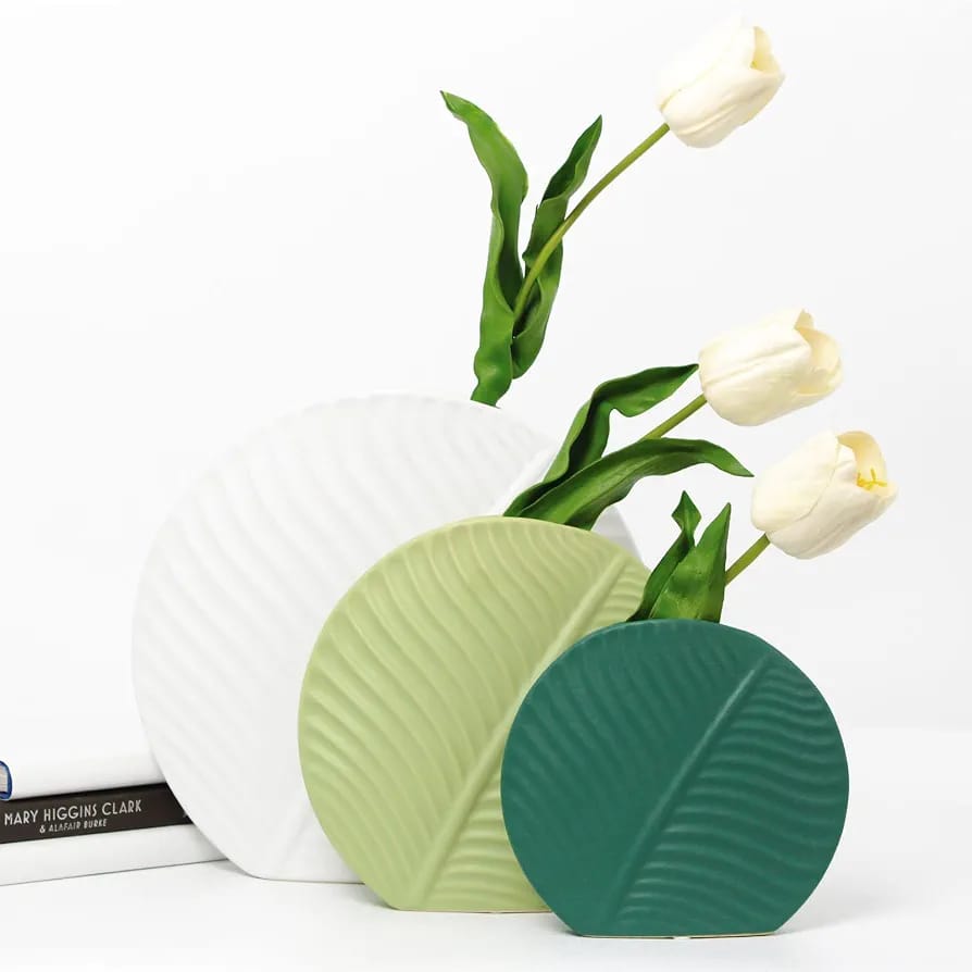 Nordic ceramic vasesleaf shaped ceramic vaseset of 3 ceramic vasesmodern decorative vasesribbed ceramic vaseflower vase setliving room decorative vaseceramic vase for home decormodern home decor vasedecorative vases Pakistan
