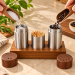 stainless steel salt and pepper shaker set, salt pepper shaker with toothpick holder, salt and pepper set with wooden stand, stainless steel seasoning shakers, dining table seasoning set, salt pepper toothpick holder, wooden stand salt pepper set, tabletop condiment set, kitchen table organizer, dining table accessories, seasoning organizer, salt and pepper shakers Pakistan, salt pepper set Pakistan, kitchen accessories Pakistan, dining table accessories Pakistan