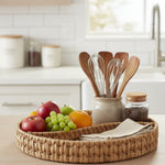 Round handwoven natural fiber basket tray with divider for serving and storage. Home Hatch Pakistan