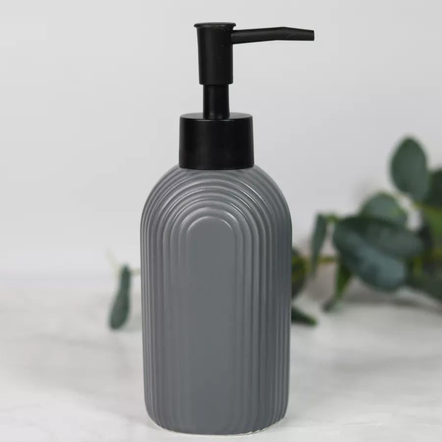 Modern ceramic bathroom accessories set – soap dispenser, tumbler, and soap dish in grey, black, and white by Home Hatch Pakistan