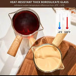 Multi-purpose glass server with wooden handle, used for coffee, milk, sauces, salad dressings, and condiments.