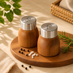 wooden salt and pepper shaker set, wooden salt pepper shakers, salt and pepper set of 2, stainless steel lid shakers, wooden seasoning shakers, salt pepper shaker set, dining table salt pepper set, kitchen seasoning set, wooden kitchen accessories, dining table accessories, wooden tableware, salt and pepper shakers Pakistan, wooden salt pepper set Pakistan, kitchen accessories Pakistan, buy wooden salt pepper shakers Pakistan